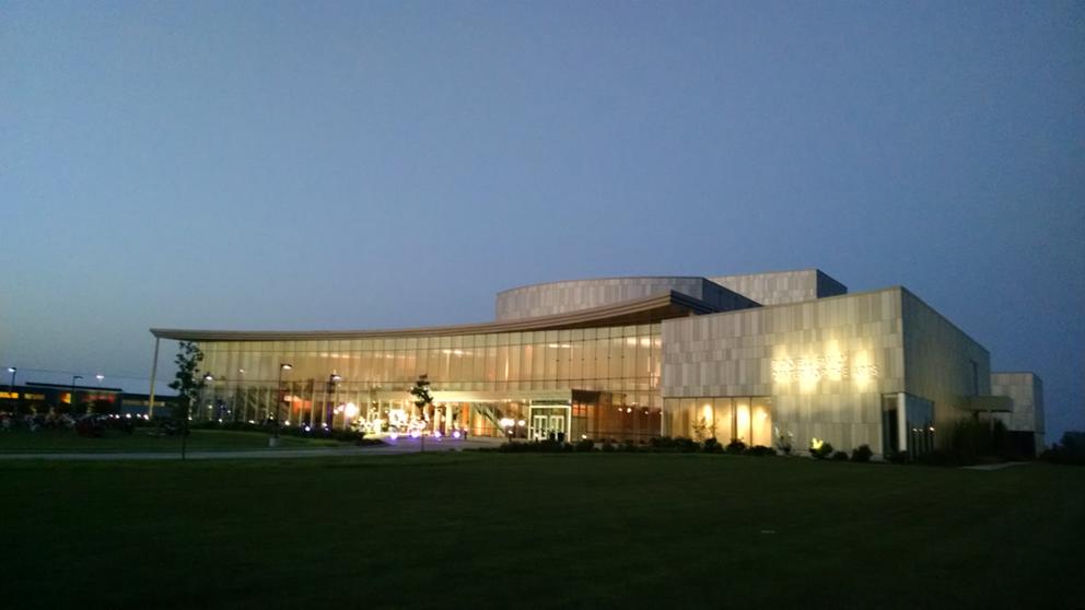 Front of the building at dusk